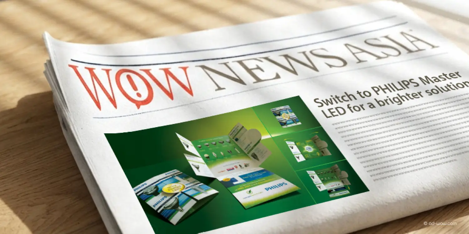 WOW News Asia newspaper featuring a Philips LED advertisement for the MASTER LED range